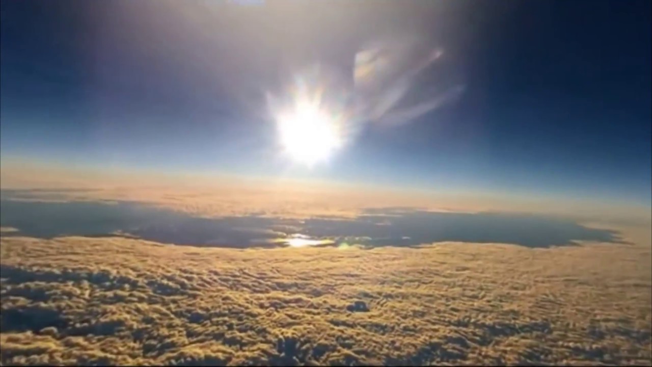 Balloon footage showing a bright hot-spot of sunlight on a cloud sheet.